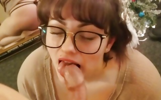 Sexual hooker in her glasses swallowing a greater lollipop